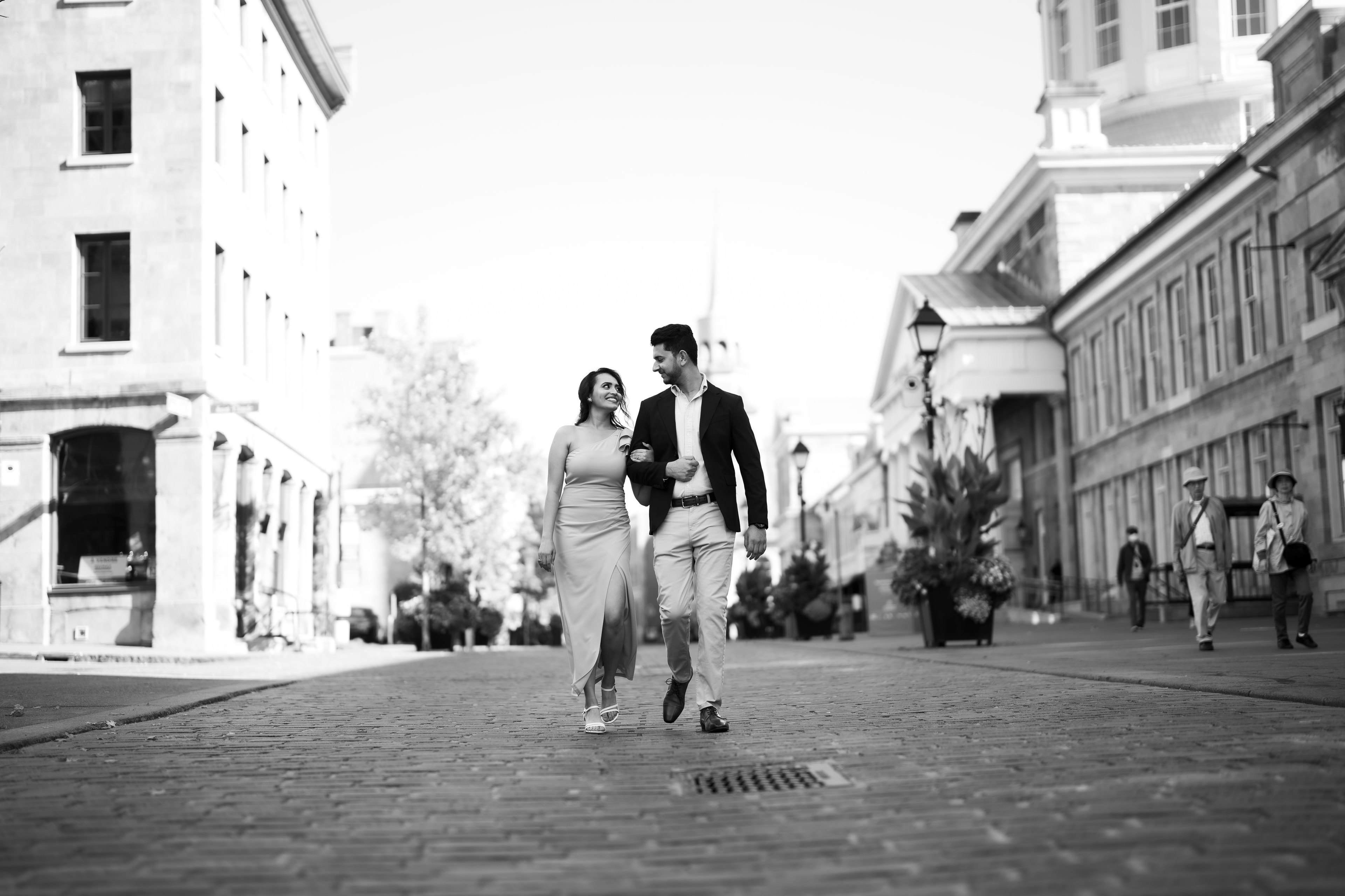 engagement couple black and white Old Montreal street