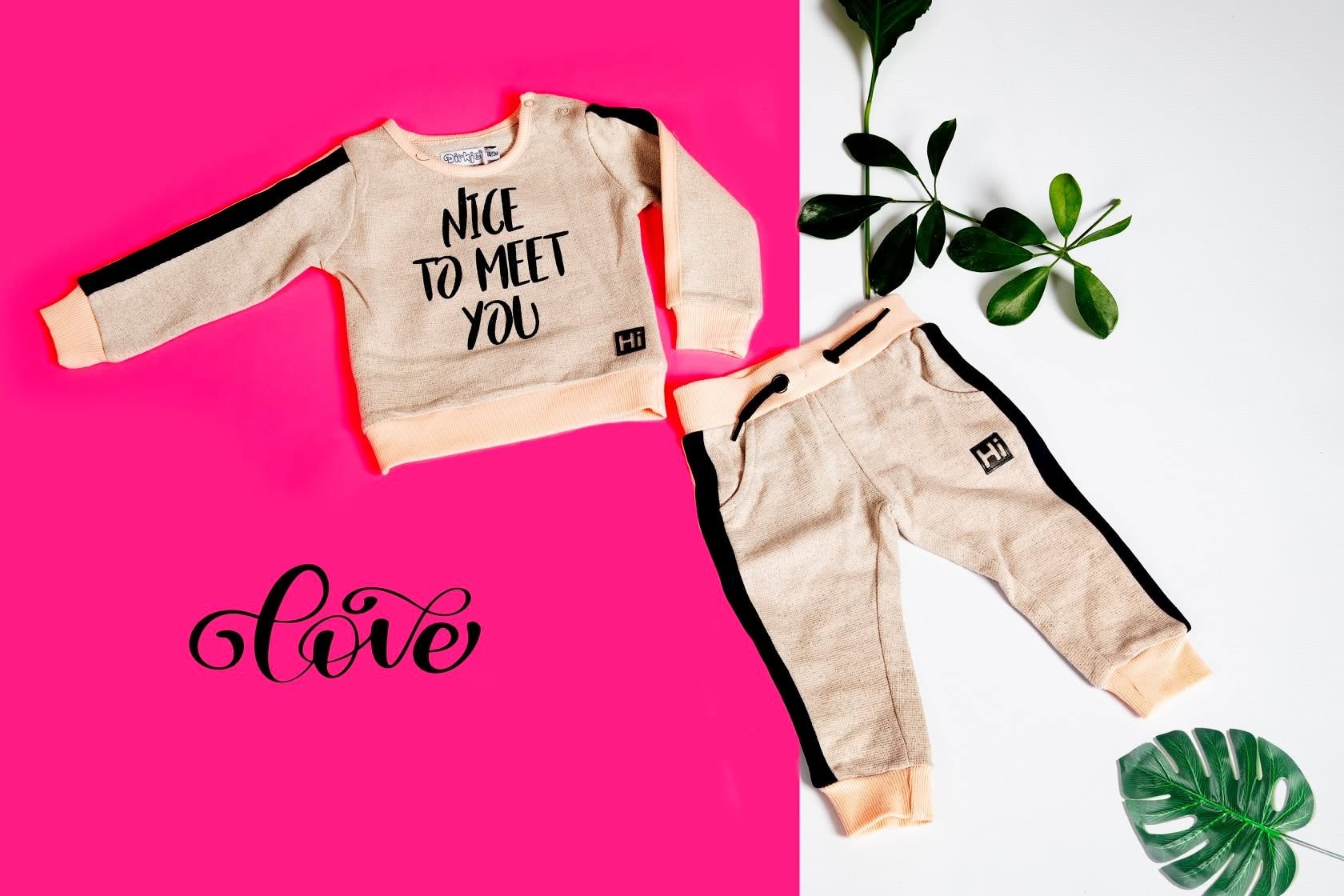 baby clothing flat lay pink white background product photography